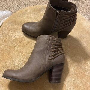 Madden Girl zip up bootie  2 inch heal, barely used and perfect condition